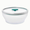 A 12-Cup Glass Round Deep Dish with a frosted finish, transparent lid, and teal center knob, ideal for meal-prepping or storing batch soups, displayed on a white background.