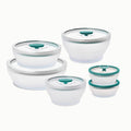 A set of the 12-Piece Glass Round Dish Set, featuring clear, round food storage containers with white bases and green-accented lids in assorted sizes, arranged on a white background.