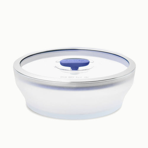 A 7-Cup Glass Round Shallow Dish with a clear lid and a blue silicone vent in the center—ideal for reheating leftovers or steaming asparagus with ease.