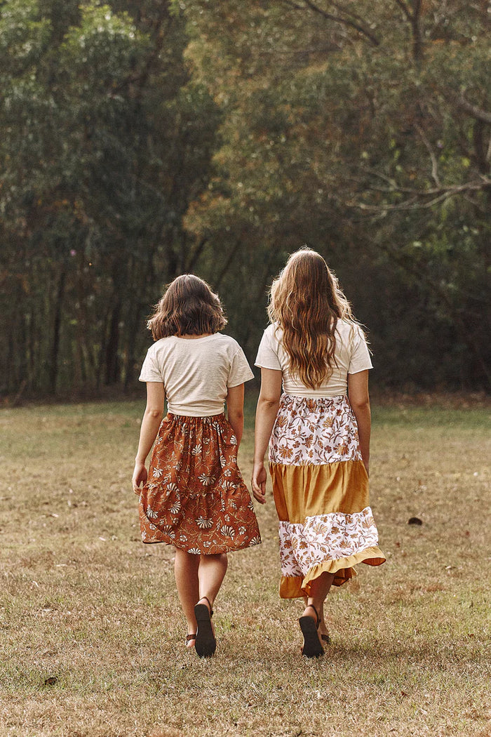 ladies wearng skirt made of Fawn Skirt Set PAPER Pattern - Gathered Mini, Maxi, and Shirred Mini Skirt Patterns