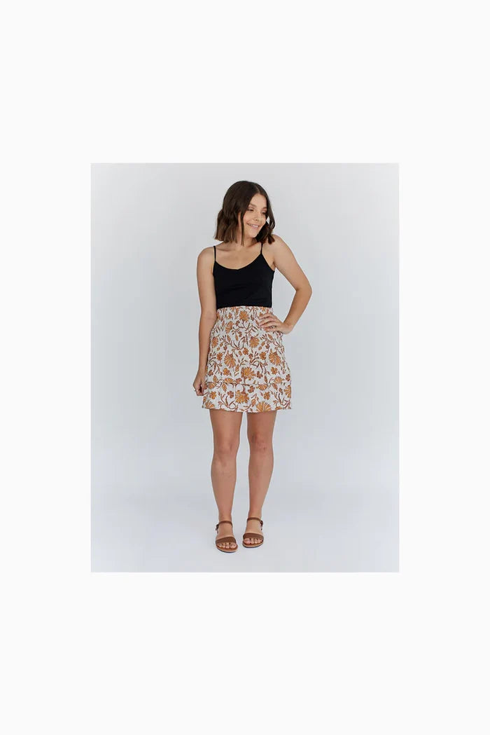 lady wearng skirt made using Fawn Skirt Set PAPER Pattern - Gathered Mini, Maxi, and Shirred Mini Skirt Patterns