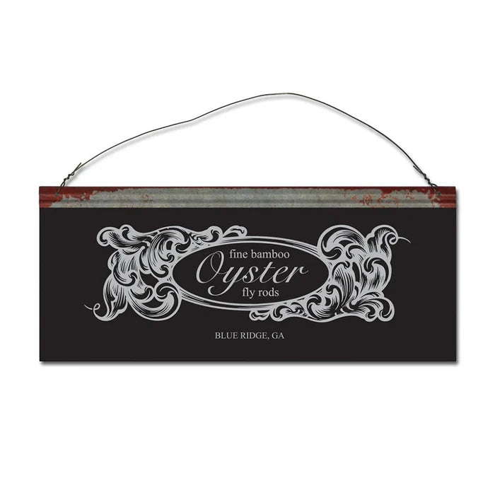 Metal rustic sign featuring engraving style pattern of Oyster Fine Bamboo Fly Rods logo.