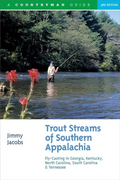 Print cover of Trout Streams of Southern Appalachia by Jimmy Jacobs featuring a woman fly fishing in a lake.