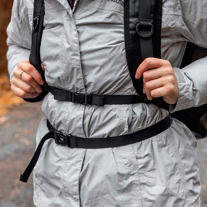 Person hiking with waterproof backpack